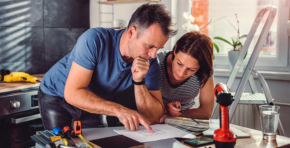 Couple working on home renovations